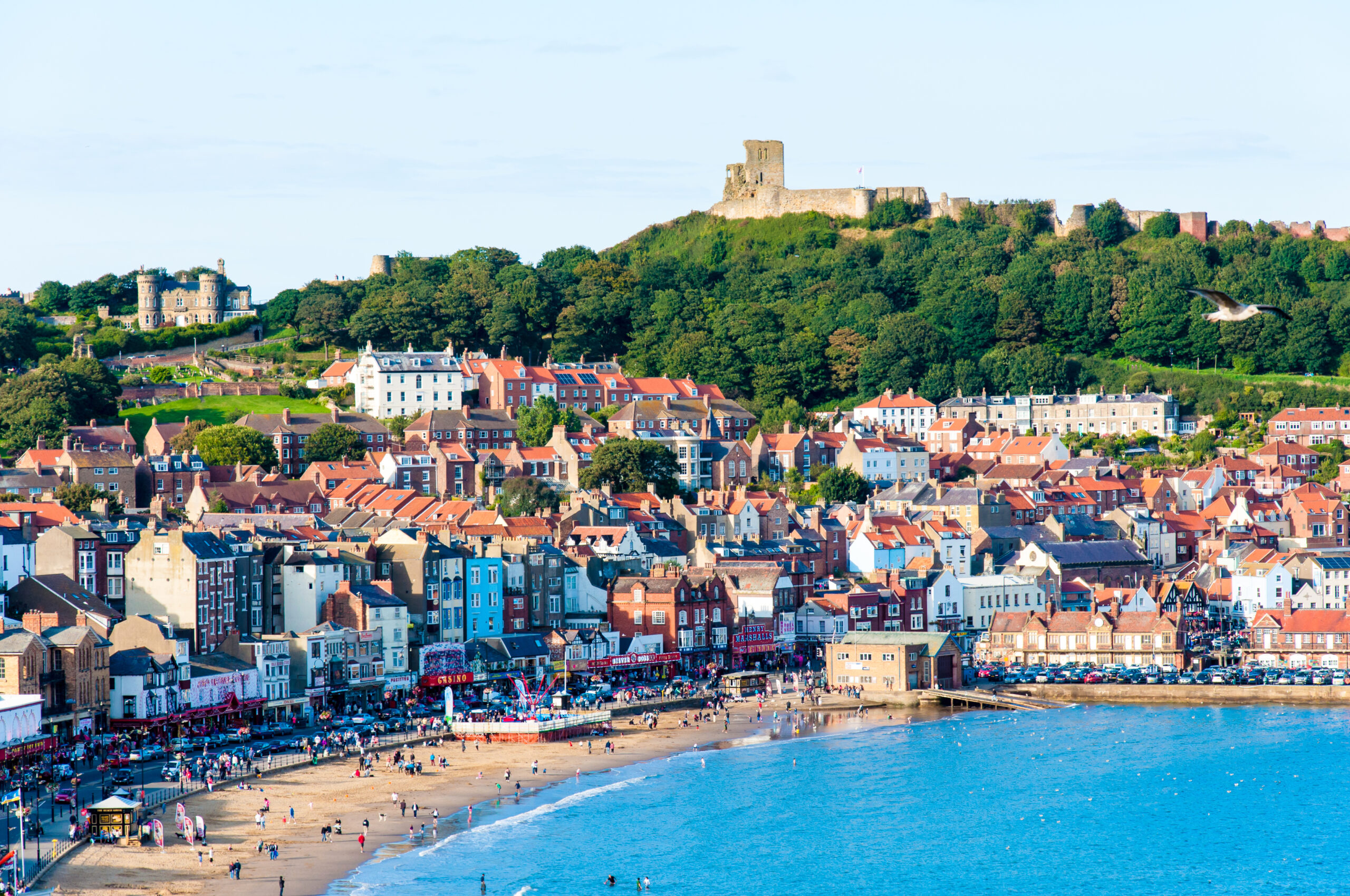 Rooftops and properties overlooking Scarborough seafront and Scarborough Castle